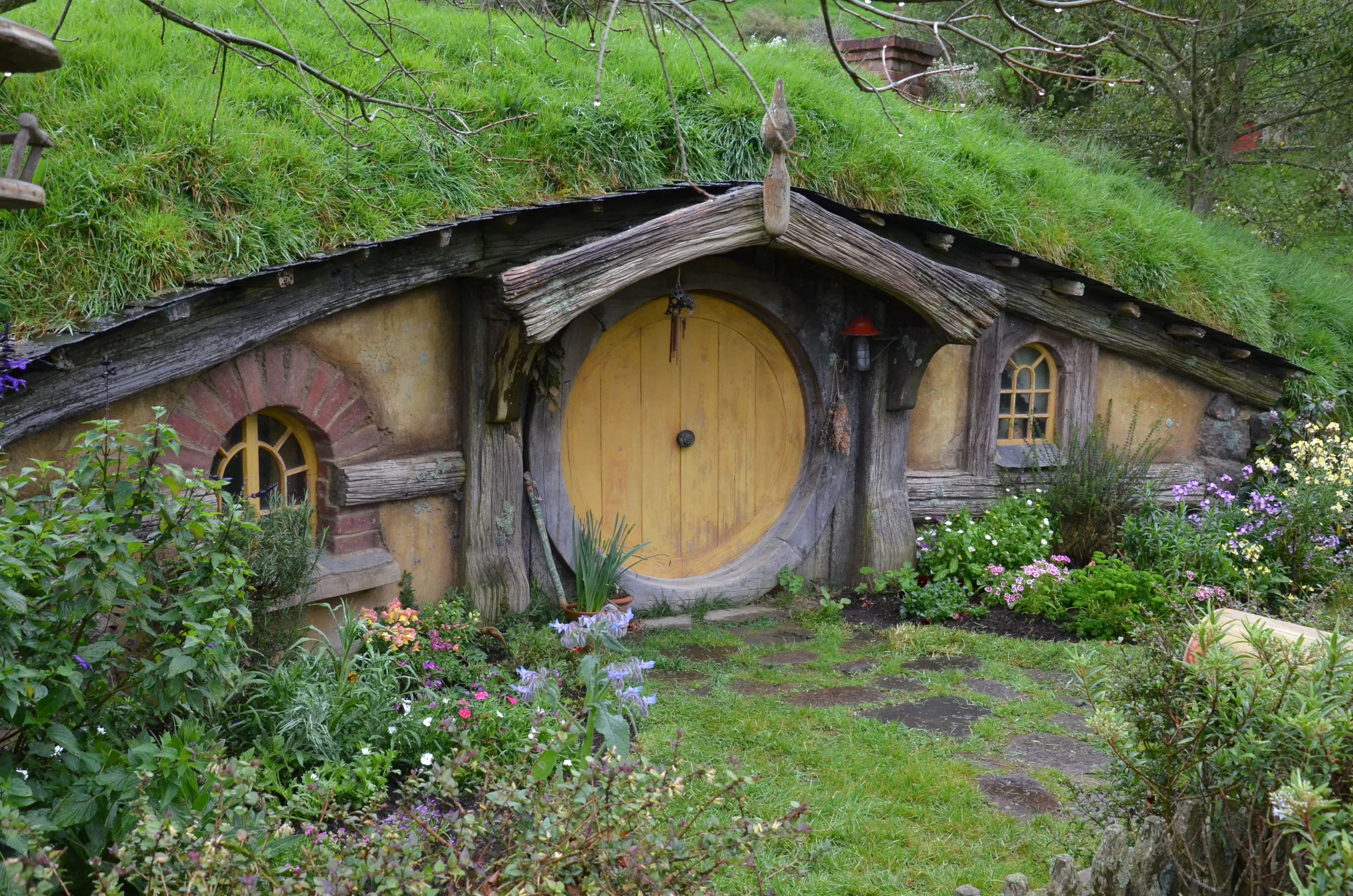 Hobbit hole at Hobbiton Movie Set in Matamata — the only permanent Lord of the Rings filming location in New Zealand